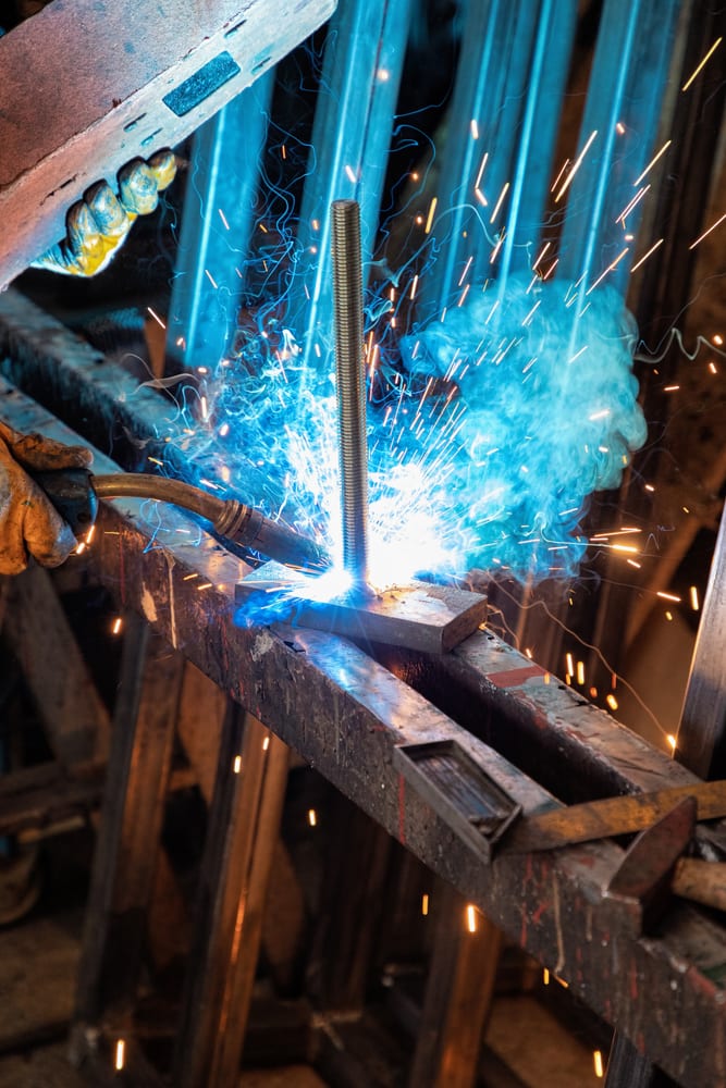 welder performing braze welding